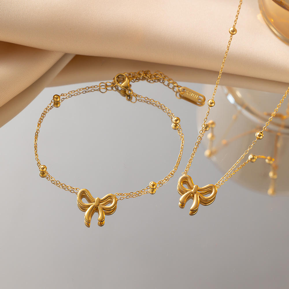 BOW NECKLACE AND BRACELET