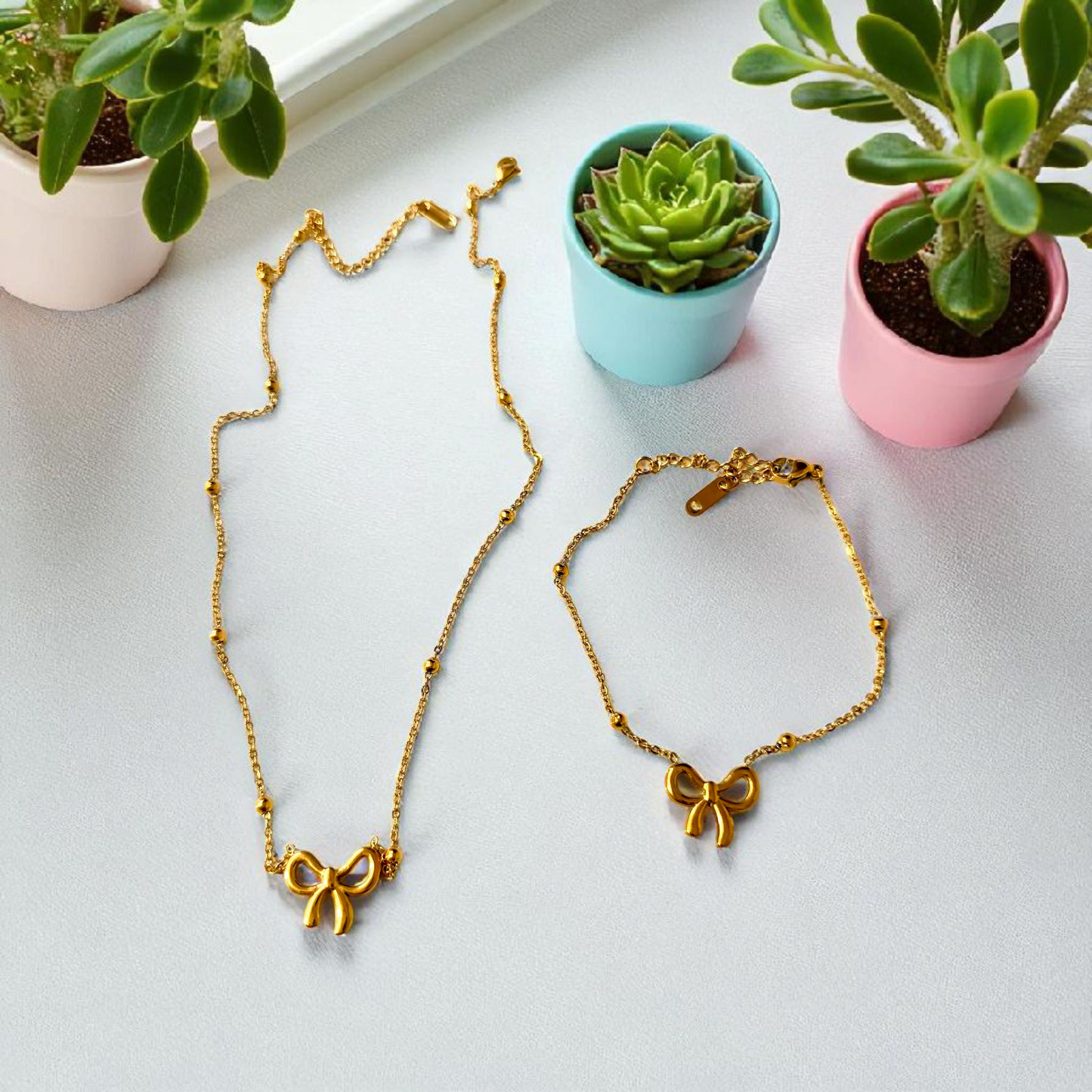 BOW NECKLACE AND BRACELET