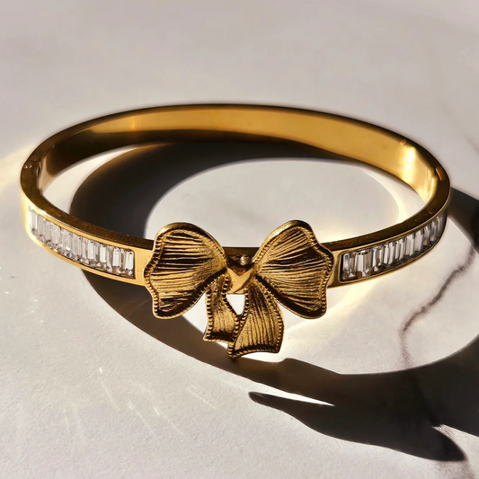 ELEGANT BOW GOLD BANGLE
