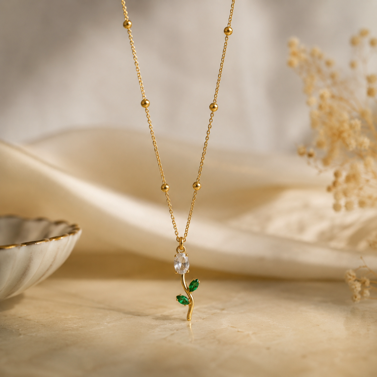 Tulip necklace with a red and green pendant 18k gold plated stainless steel and tarnish free and water resistant by efforro.