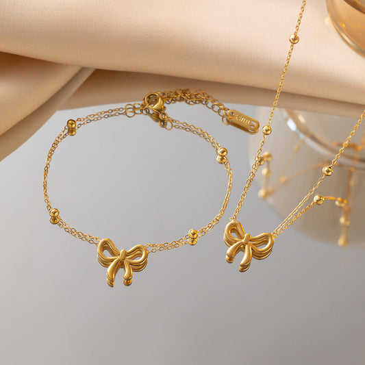 BOW NECKLACE AND BRACELET