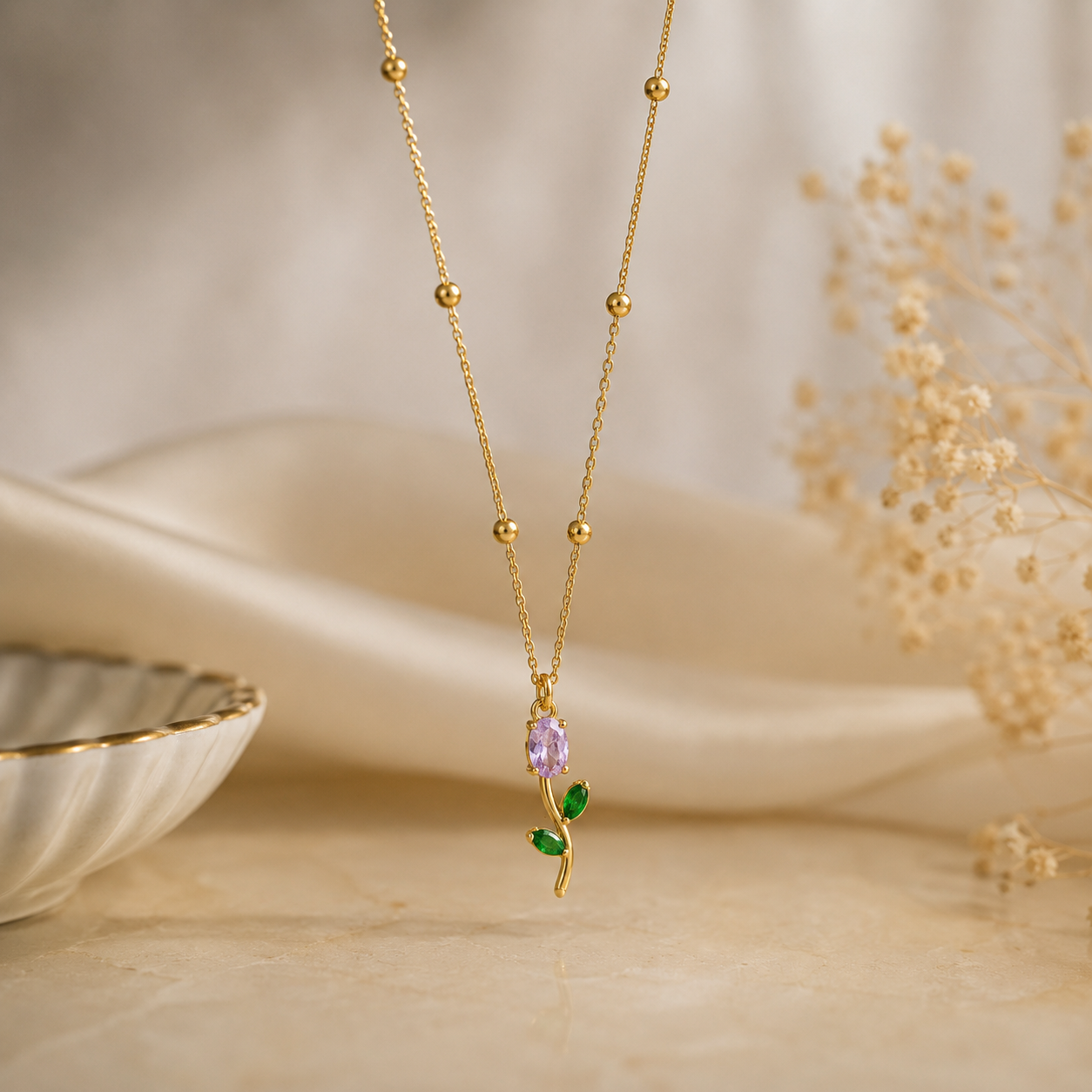 Tulip necklace with a red and green pendant 18k gold plated stainless steel and tarnish free and water resistant by efforro.