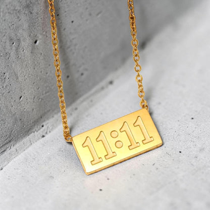 Gold necklace with '11:11' made with stainless steel and tarnish free and water resistant by Efforro Pakistan.