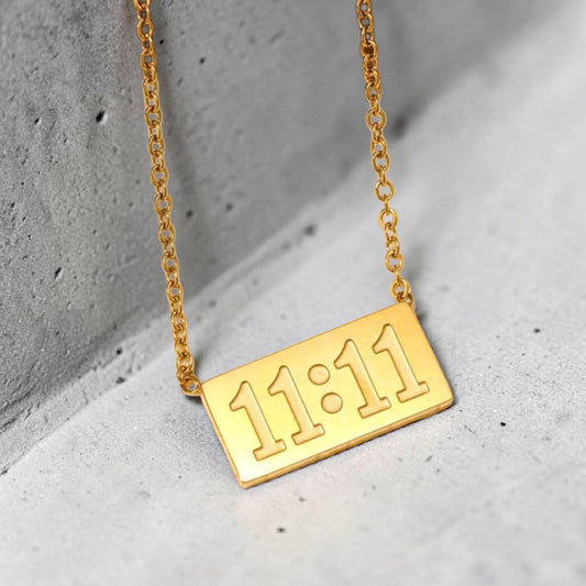Gold necklace with '11:11' made with stainless steel and tarnish free and water resistant by Efforro Pakistan.