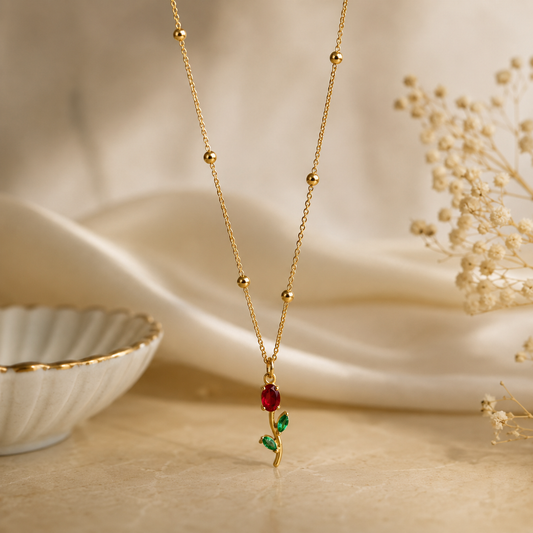 Tulip necklace with a red and green pendant 18k gold plated stainless steel and tarnish free and water resistant by efforro.
